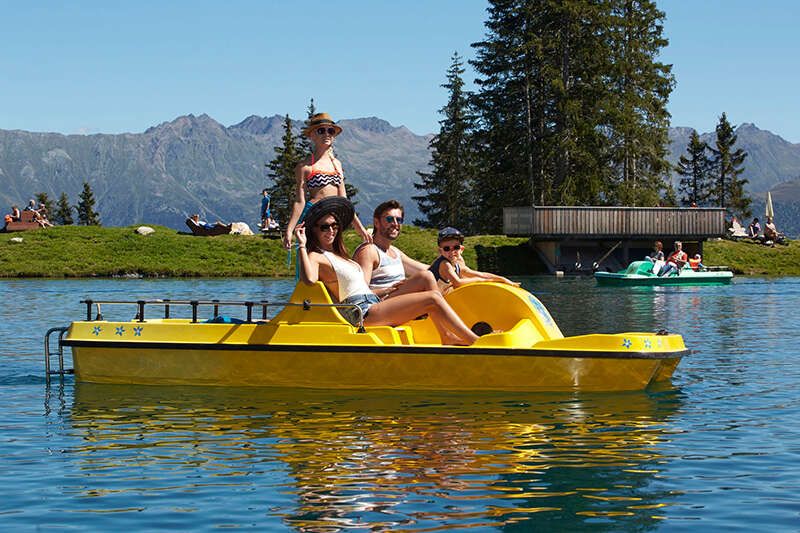 Pedal boating at the Högsee in Serfaus, Tyrol